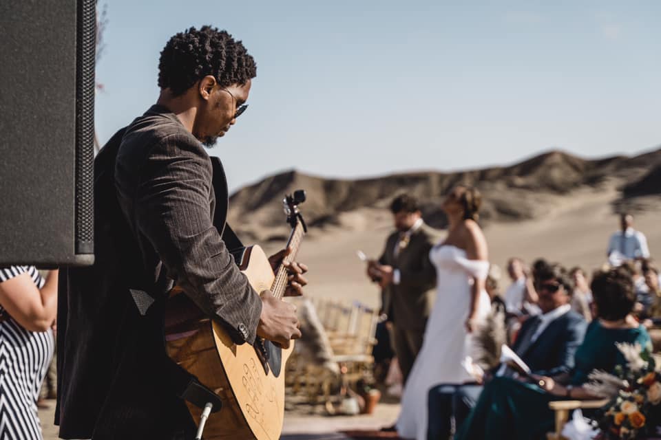 Sagarias Tsam performing in the namib desert for private event